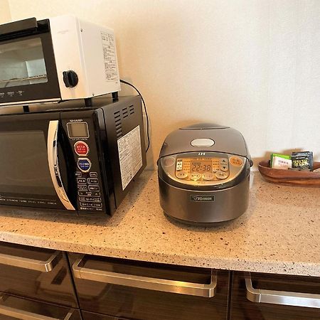 Appartement 真栄田グランブルー403 ~ Maeda Grand Blue 403 ~ à Onna Extérieur photo
