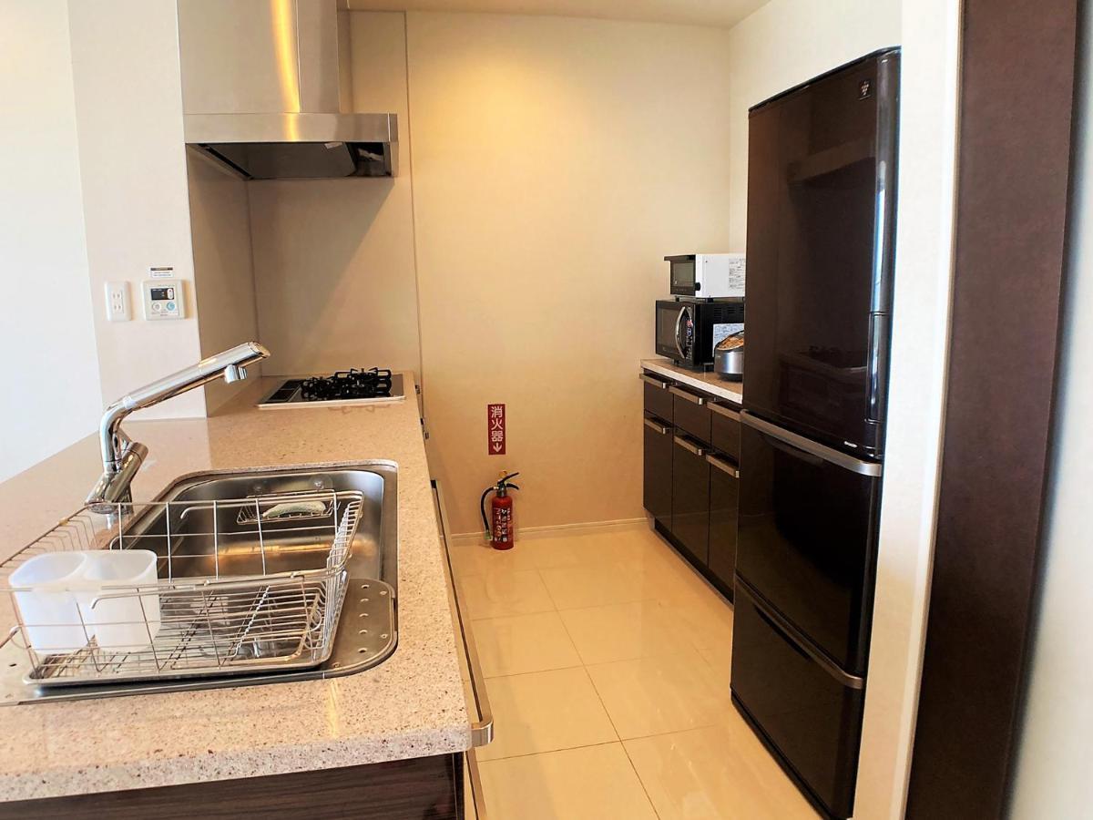 Appartement 真栄田グランブルー403 ~ Maeda Grand Blue 403 ~ à Onna Extérieur photo